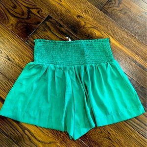 EUC TCEC green smocked waist shorts size small